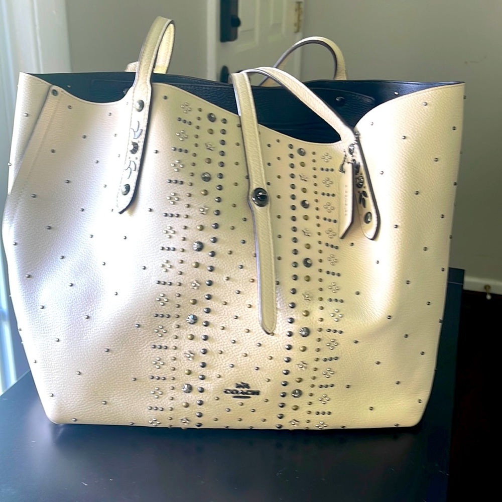 Gently used cream studded Real Coach Bag